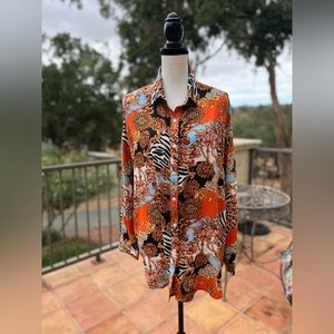 Women’s pattern blouse. Never worn. Smoke free home